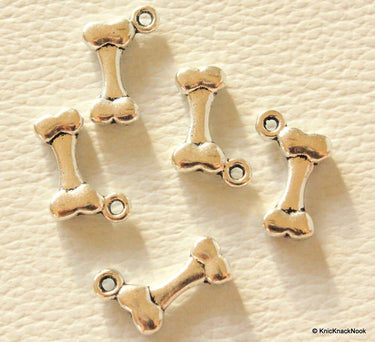 Bone Silver Tone Charms x 7